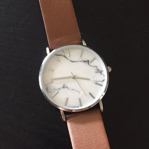 Marble face, brown strap watch. As new!
